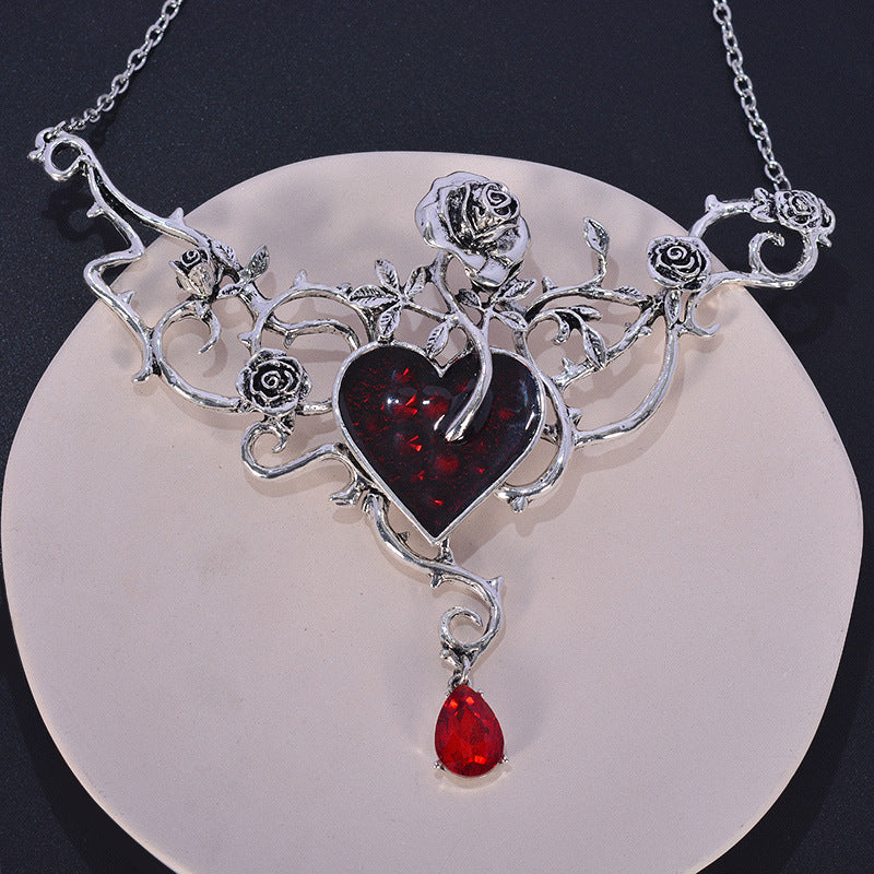 Blackened Silver Heart Necklace with Blood-Red Garnet & Thorned Rose Details - Dark Romantic Jewelry for Alternative & Mystic Style
